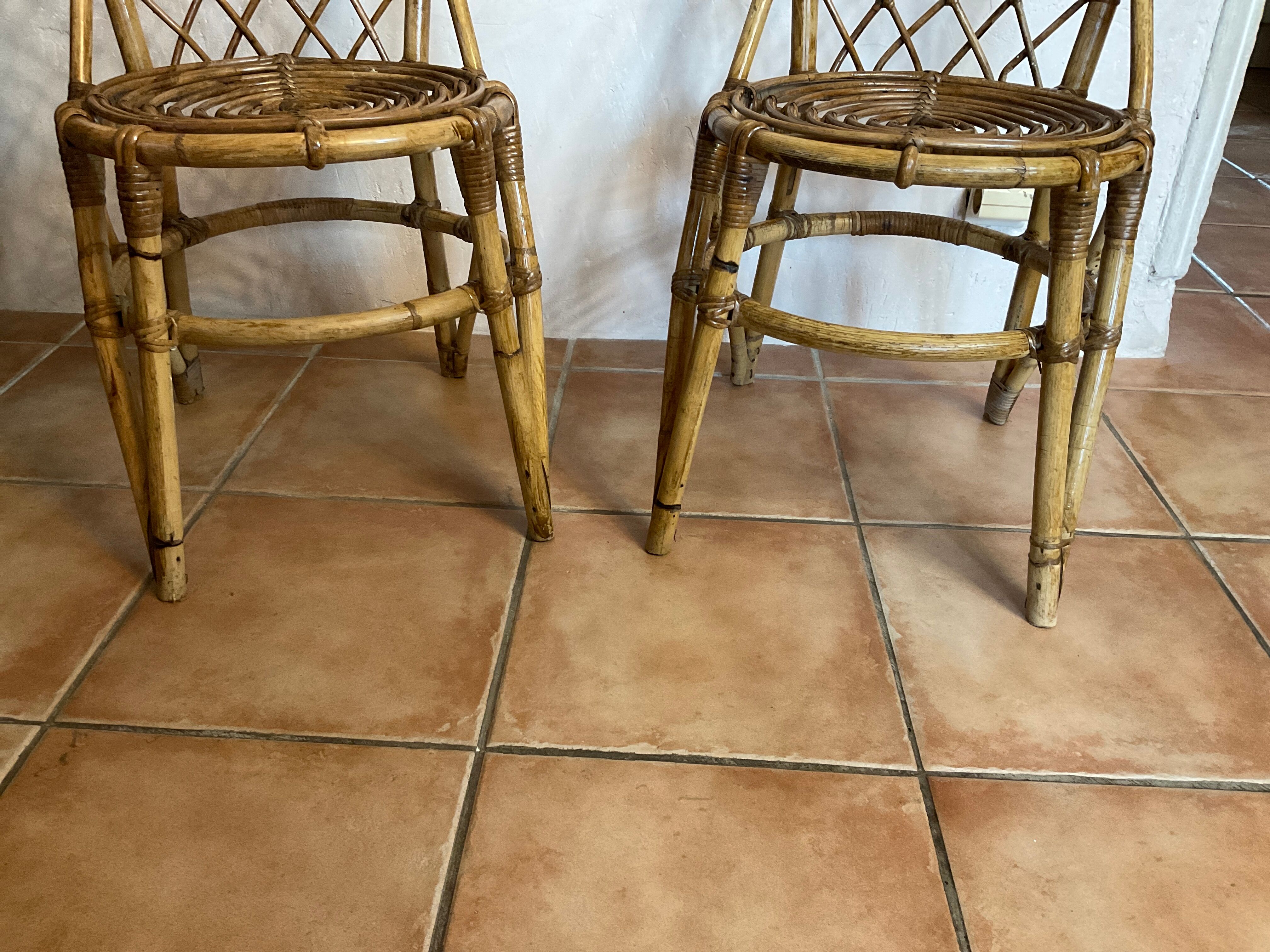 Pair of vintage rattan chairs Louis Sognot