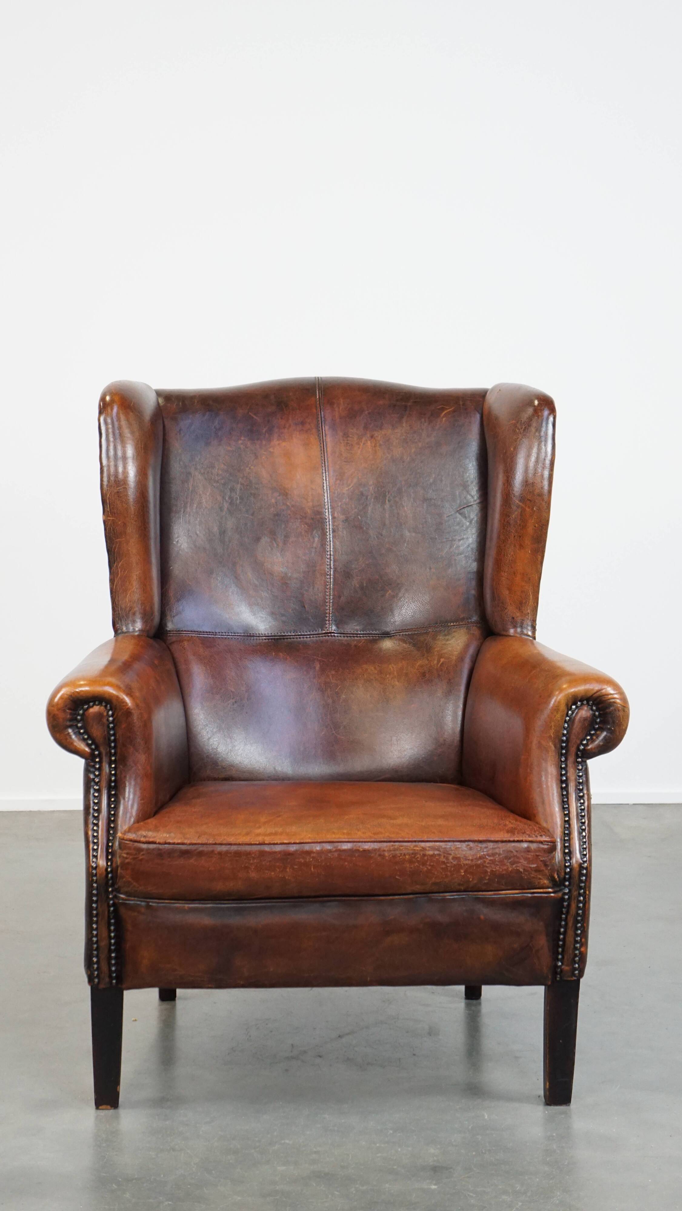 Vintage sheep leather wingback chair