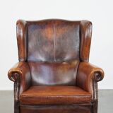 Vintage sheep leather wingback chair