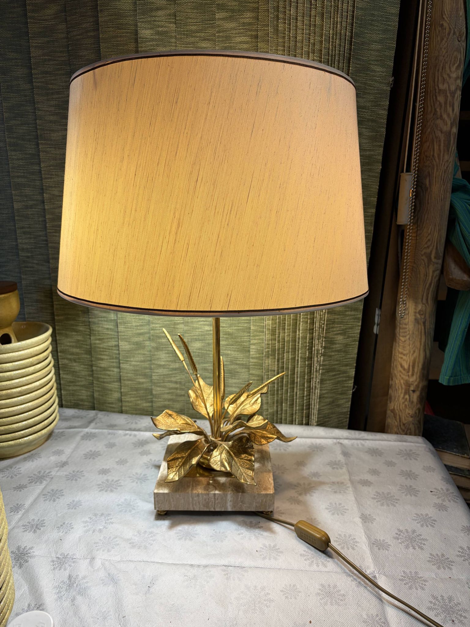 Bronze and travertine water lily lamp attributed to Maison Charles, circa 1970.