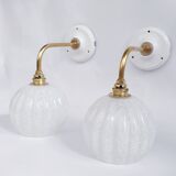 Brass and speckled glass wall lights from Clichy