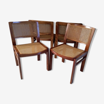 Suite de 4 chaises Baumann cannées 1970
