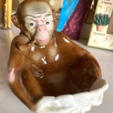 Pipe holder, ashtray or monkey pocket emptier