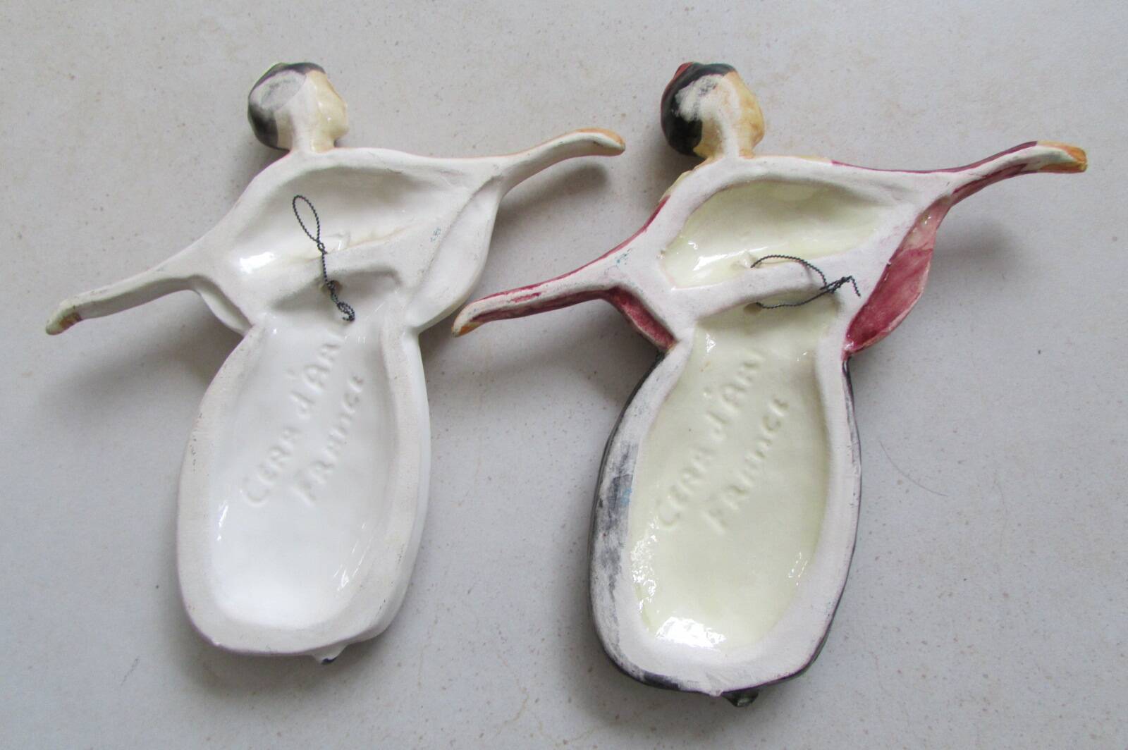 Couple of ceramic wall-mounted Arlesiennes