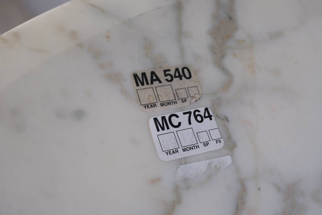 Tulip dining table in marble by Eero Saarinen for Knoll International.