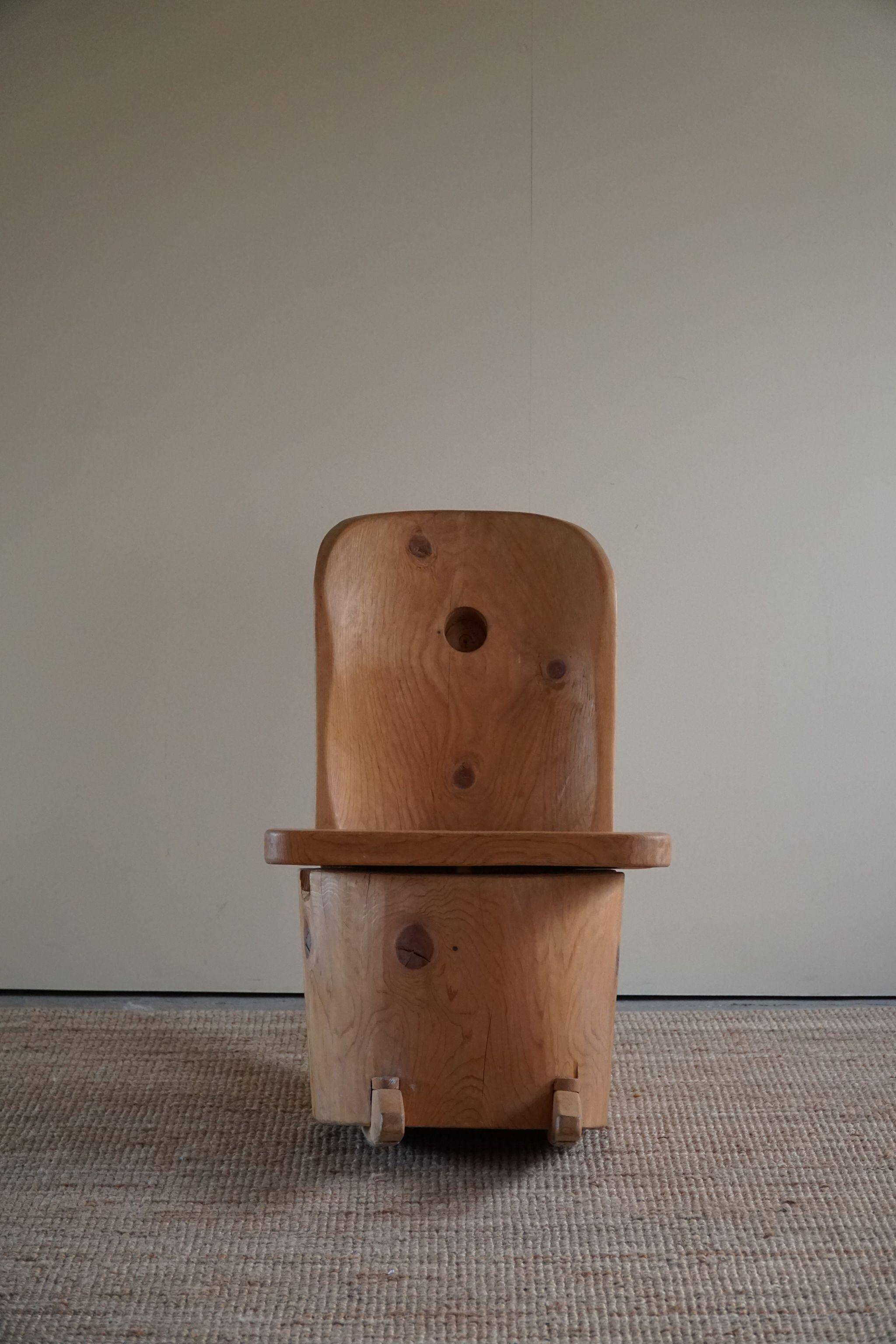 Unique sculptural rocking chair by the Finnish Matti Martikka in solid pine, 1960s.