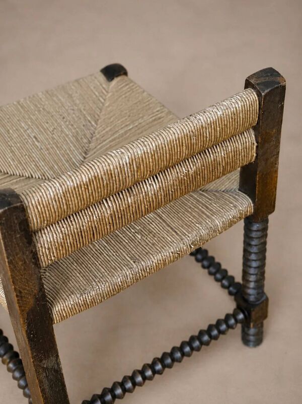 Fauteuil d'angle à piétement tourné en chapelet, dans le goût de Charles Dudouyt — France, circa 1940