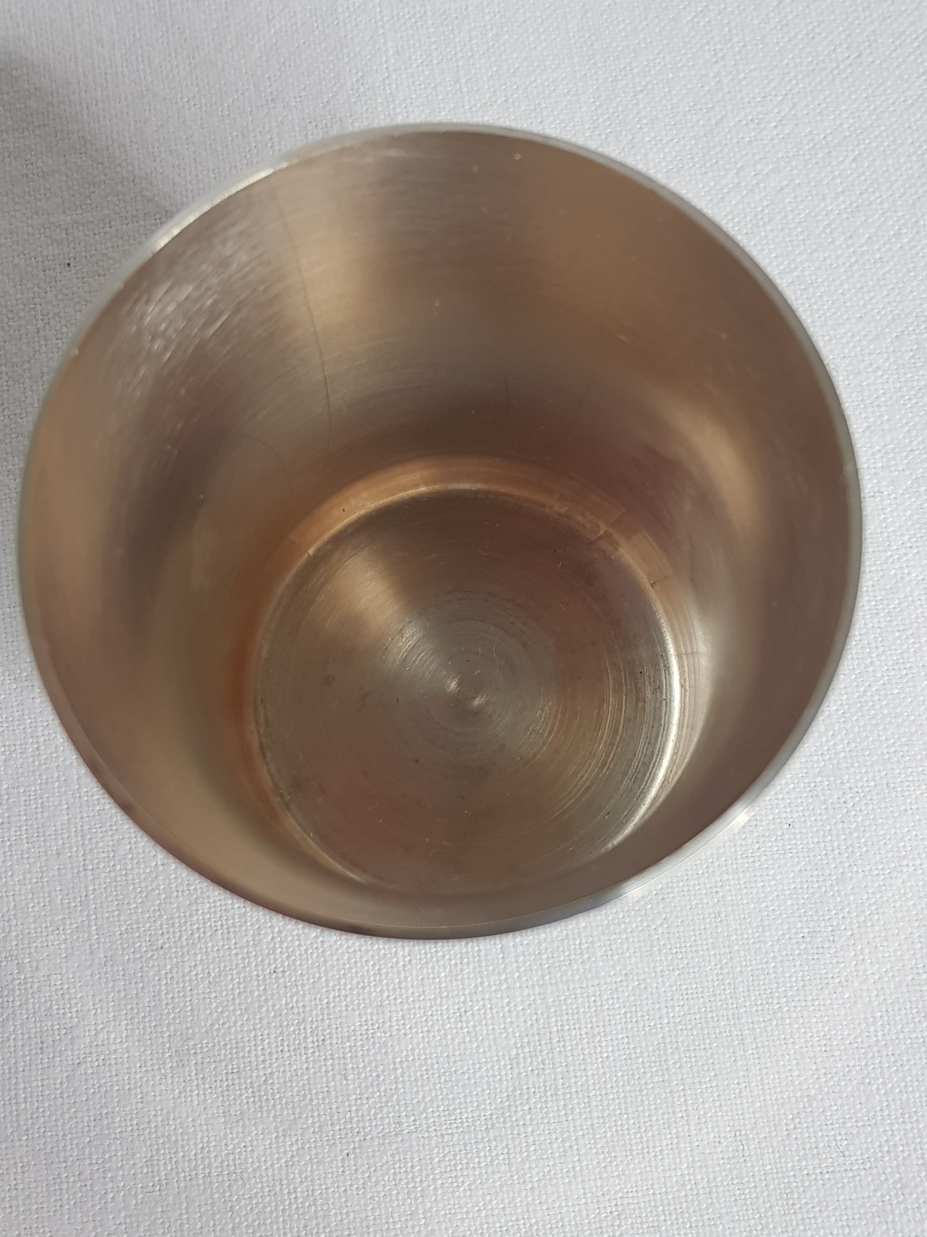 Ancient silver metal timbale engraved with rabbit motifs