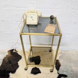 Vintage rolling table in brass and smoked glass
