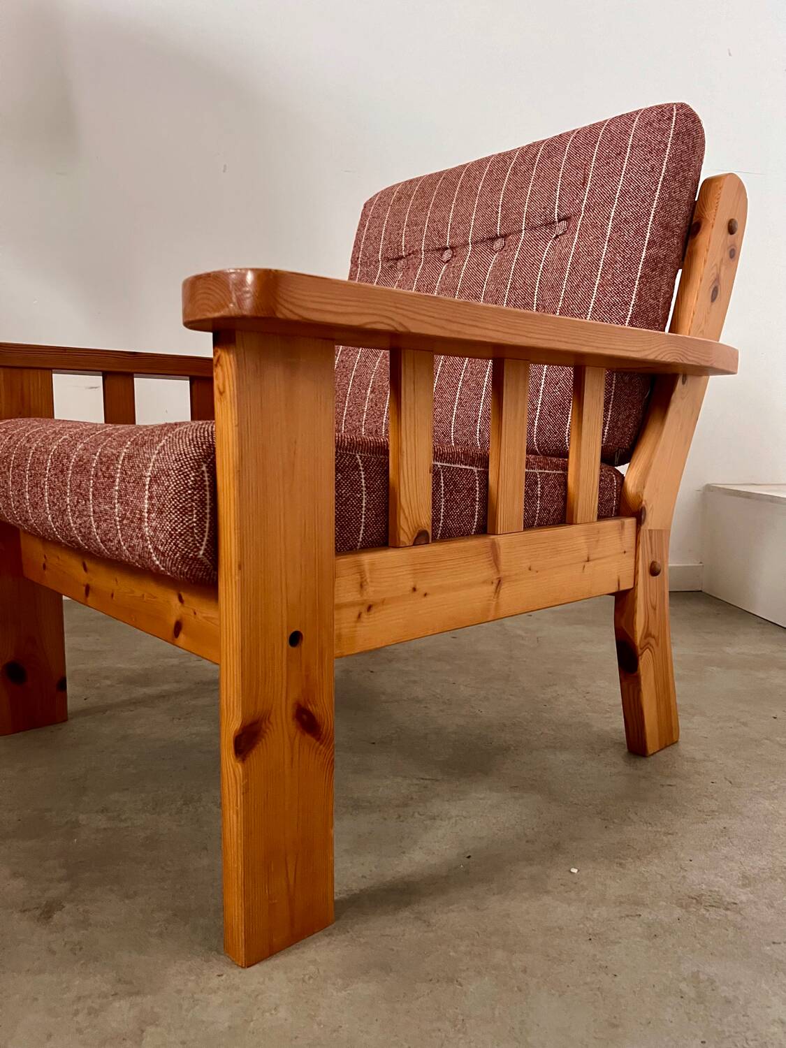 Old vintage Scandinavian design pine armchair from the 70s