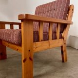 Old vintage Scandinavian design pine armchair from the 70s
