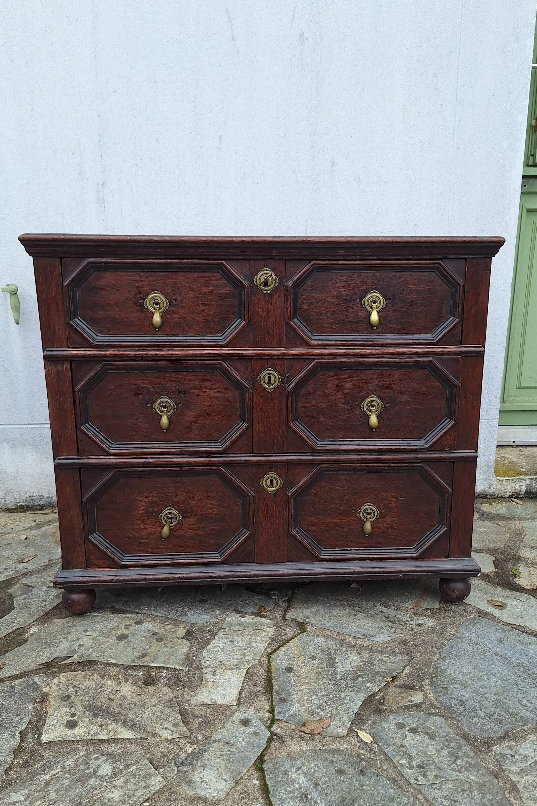 Jacobean style wooden chest of drawers