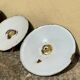 Three Suspensions enamelled sheet green and white golden threads brass socket
