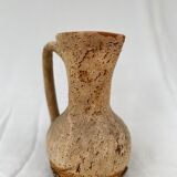 Terracotta jug covered with cork
