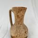 Terracotta jug covered with cork