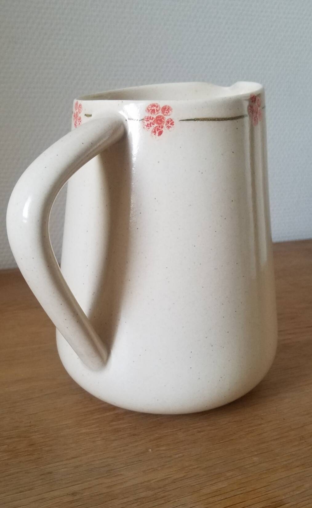 Hand-painted glazed ceramic pitcher