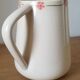 Hand-painted glazed ceramic pitcher
