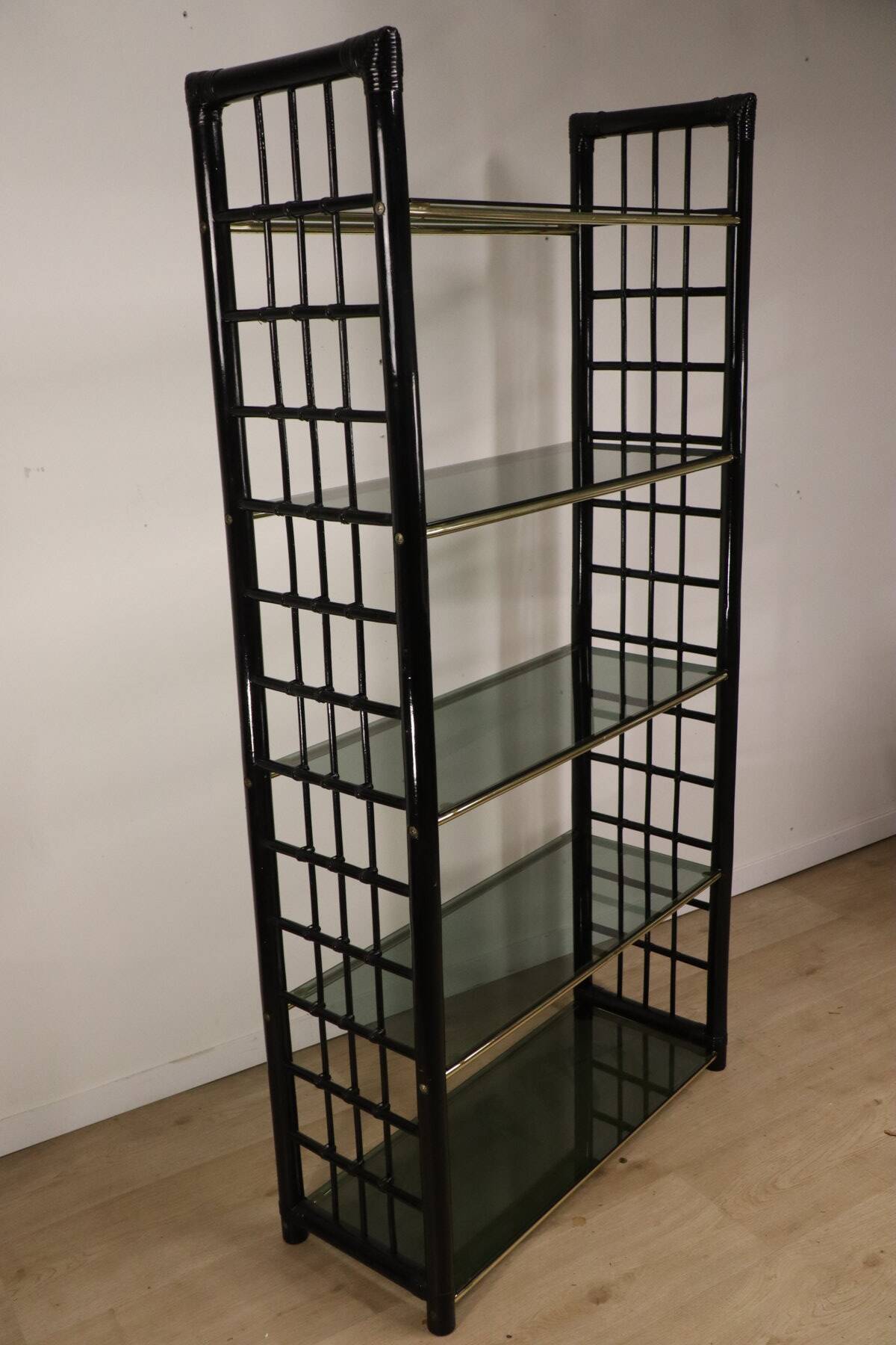 Vintage 1970s shelf in smoked glass with a bamboo-style structure.