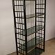 Vintage 1970s shelf in smoked glass with a bamboo-style structure.