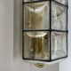Wall light "Iron Rings" in brass and glass by Glashütte Limburg, Germany, 1970s