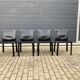 4 black Cassina Cab chairs by Mario Bellini