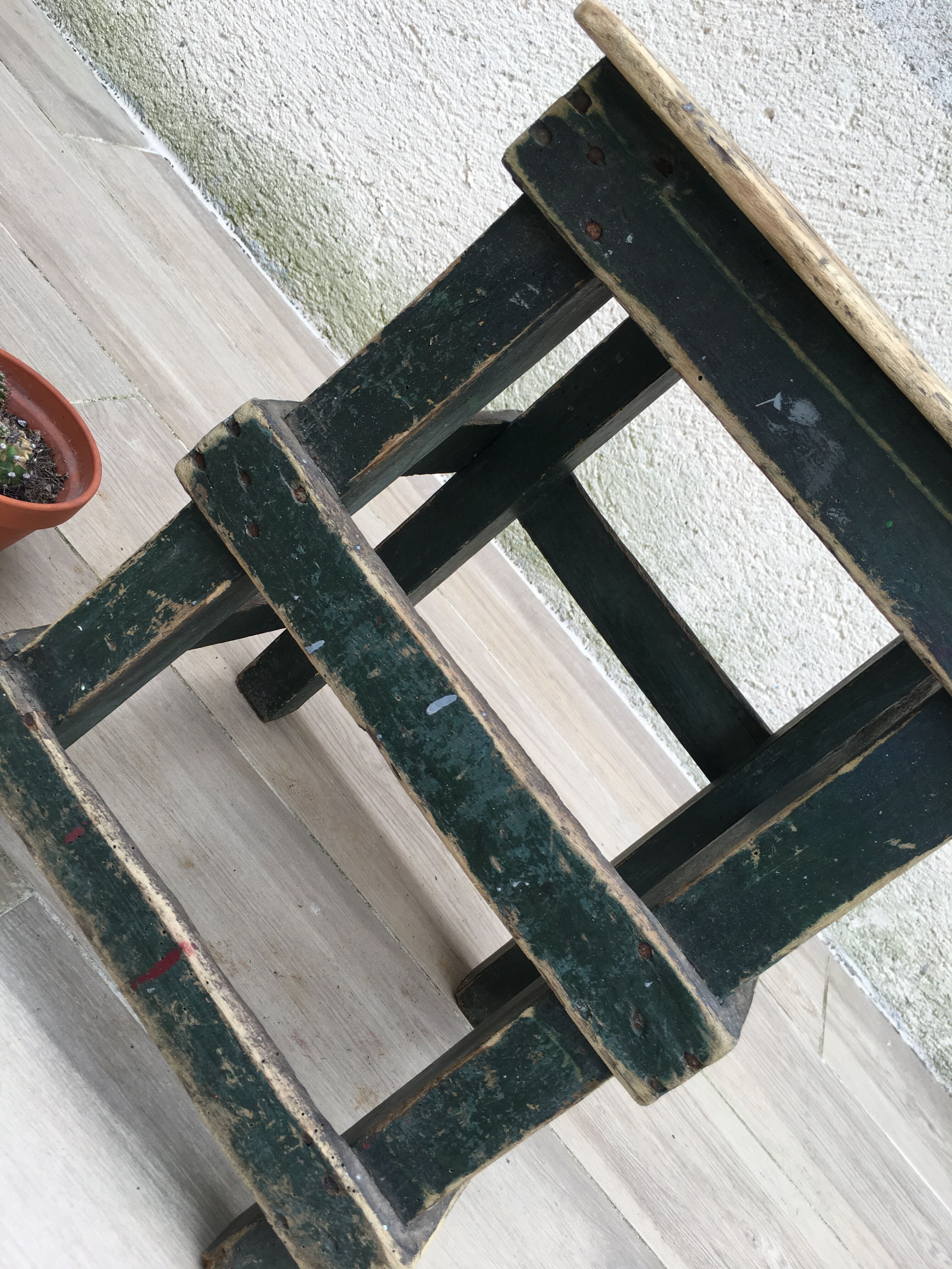 Former green workshop stool