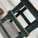 Former green workshop stool