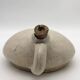 Old round sandstone hot water bottle