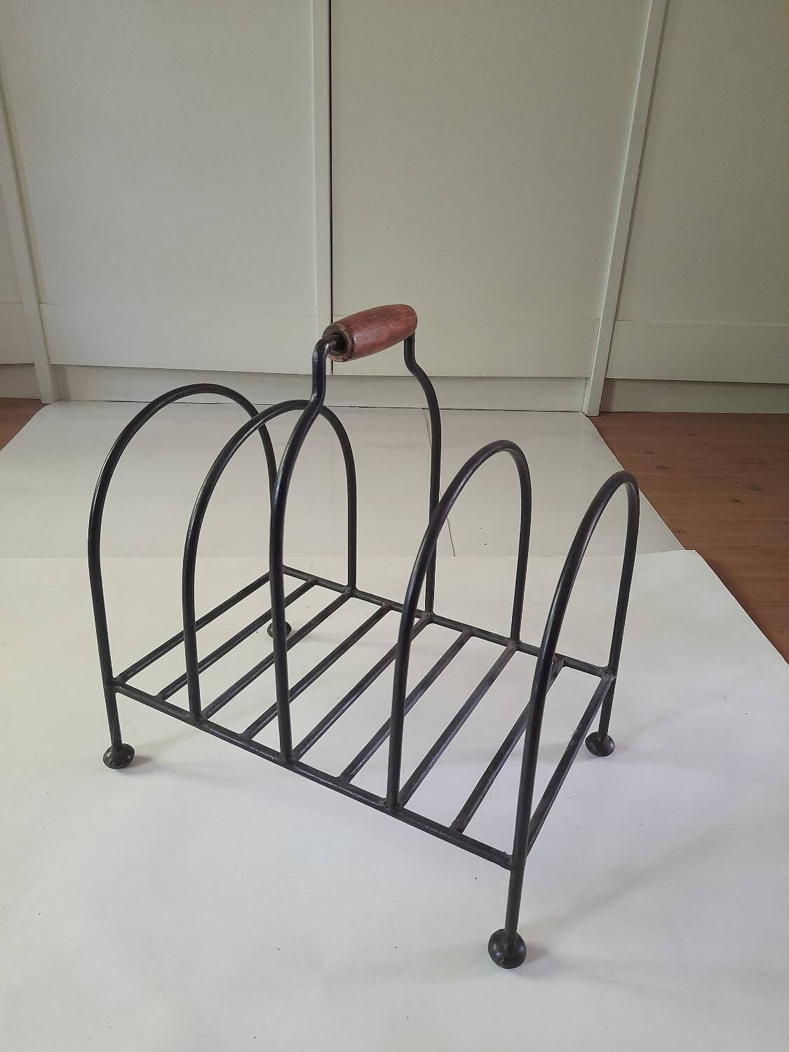 Vintage metal and wood magazine rack