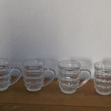 4 transparent glass mugs