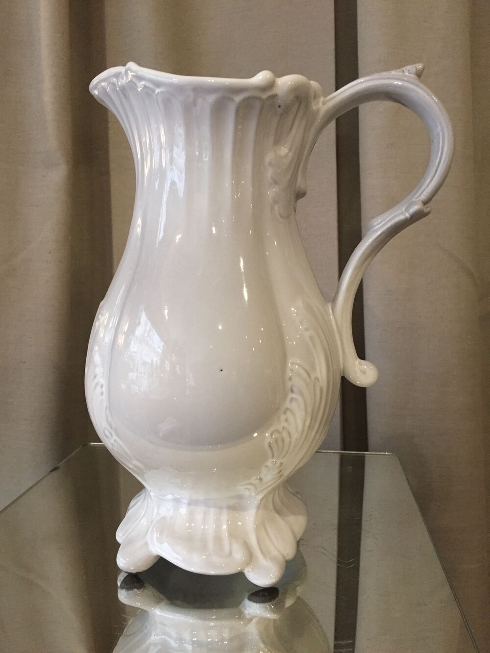 Pitcher has beautiful model beyerle niderviller black earth enamelled with white