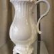 Pitcher has beautiful model beyerle niderviller black earth enamelled with white