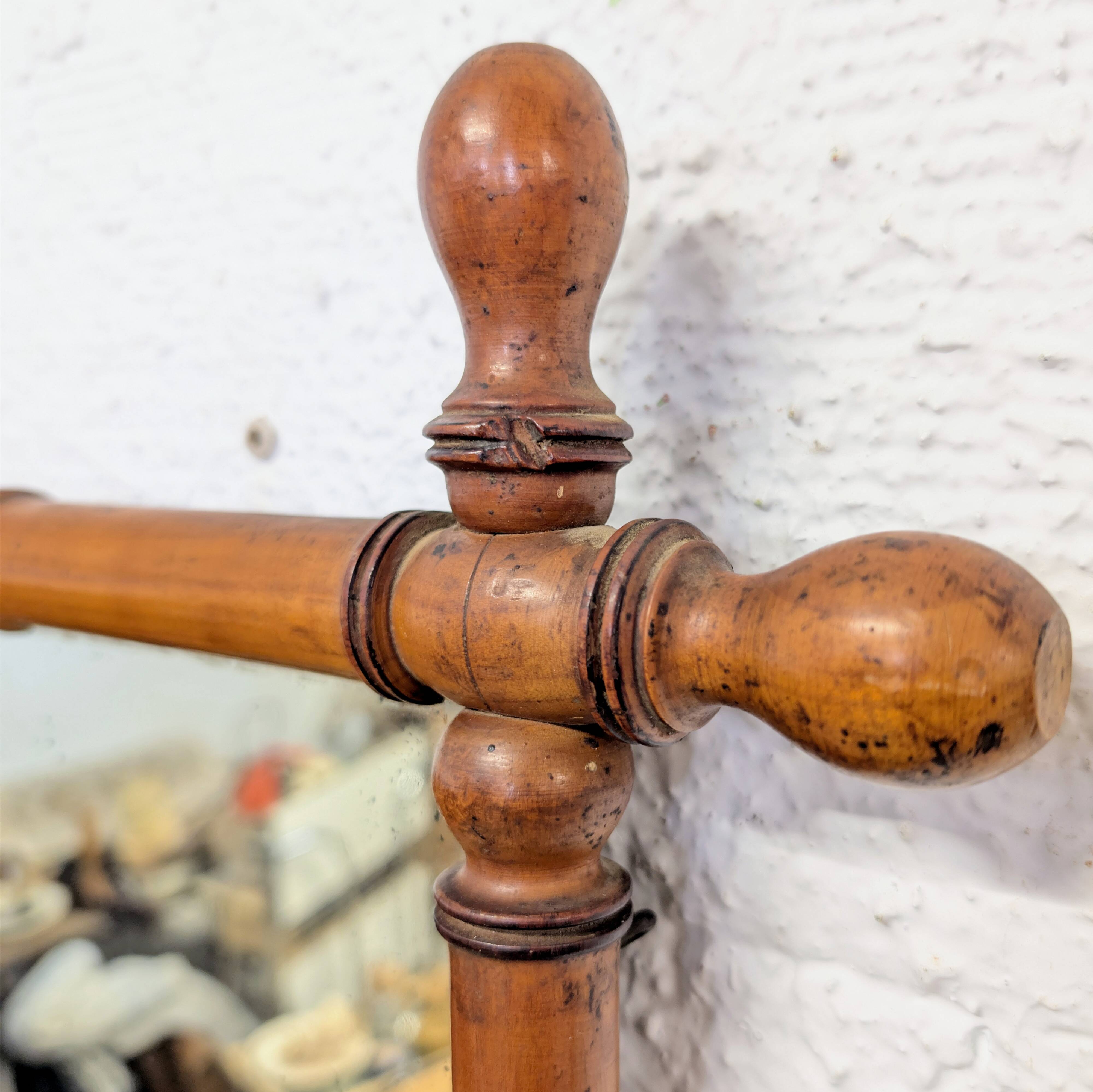 Antique turned wood mirror