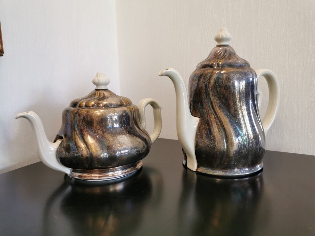 Silver-plated ceramic jug