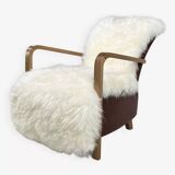Scandinavian style armchair in leather and hide