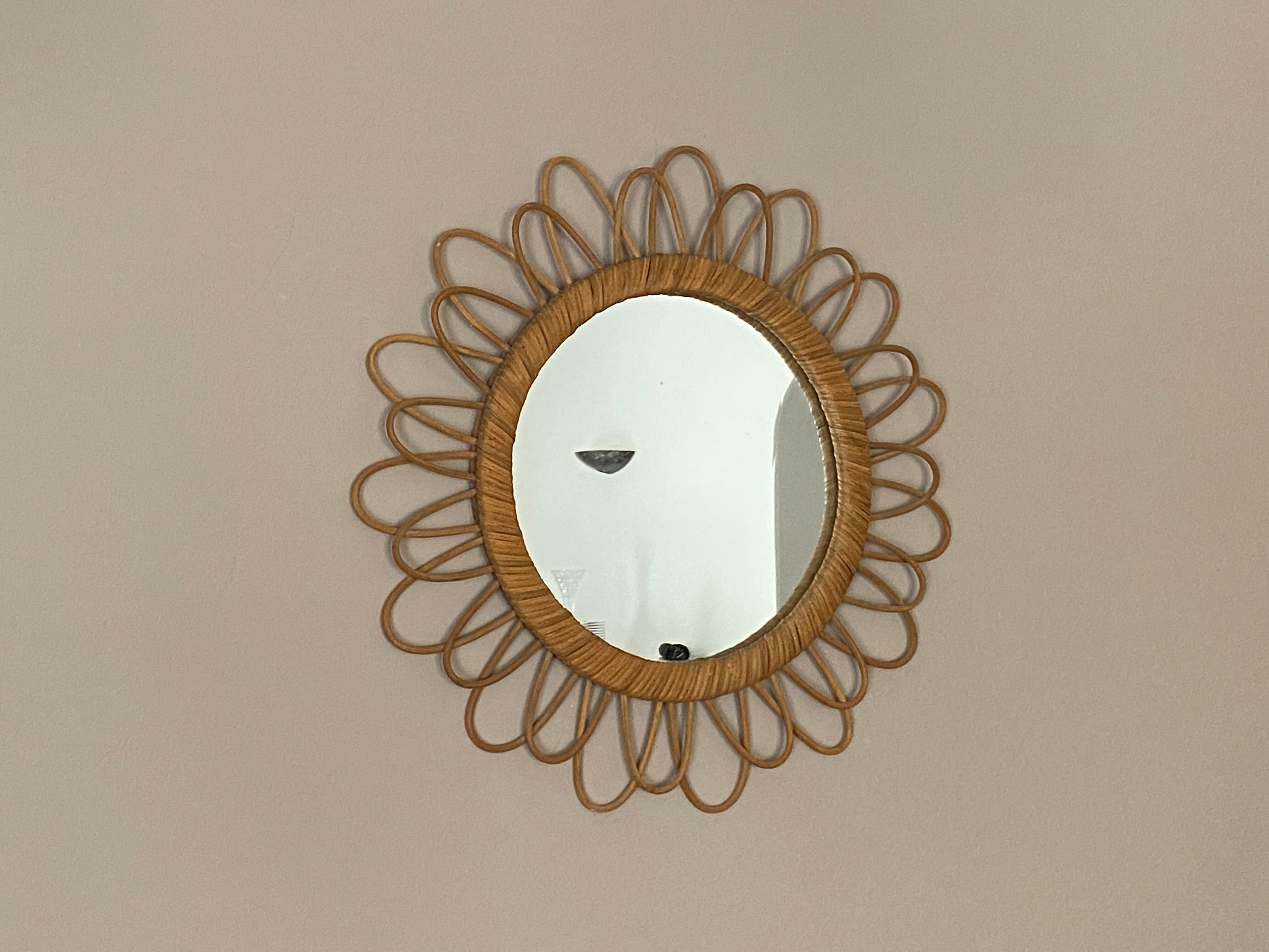 Mirror sun in rattan arched. 52cm. 1960