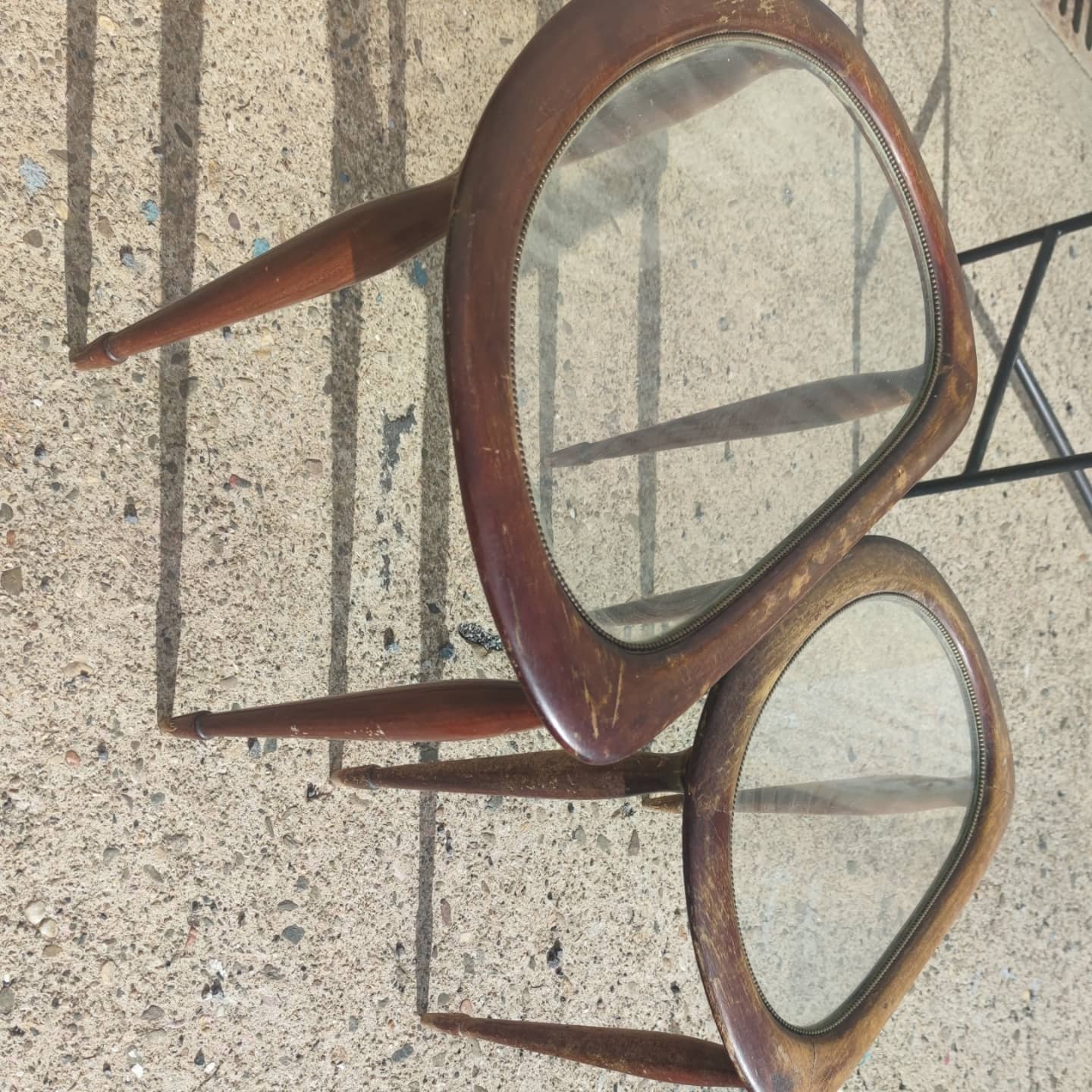 2 tables in mahogany, glass and bronze, circa 1960