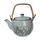 Vintage teapot wicker handle