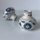 Pair of miniature blue and white Vietnamese ceramic vases with floral decoration.