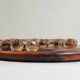 Vintage wooden solitaire game with resin balls and insects – Madaga