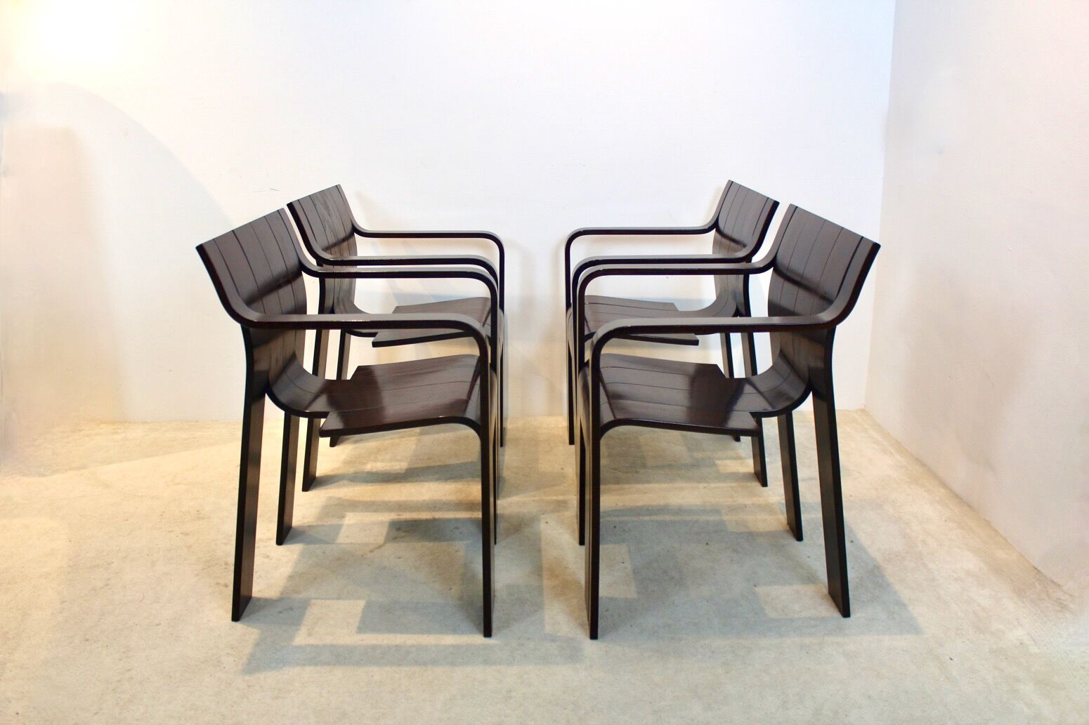 Set of four Strip dining chairs with dark brown ash armrests by Gijs Bakker for Castelijn