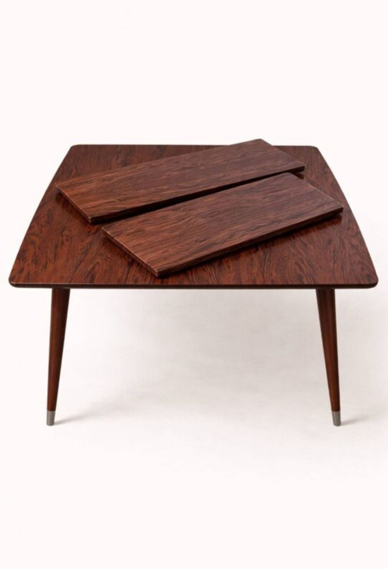 Extendable formica table from the 1960s with a Scandinavian rosewood effect.
