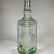 Quadrangular glass fountain and brass tap