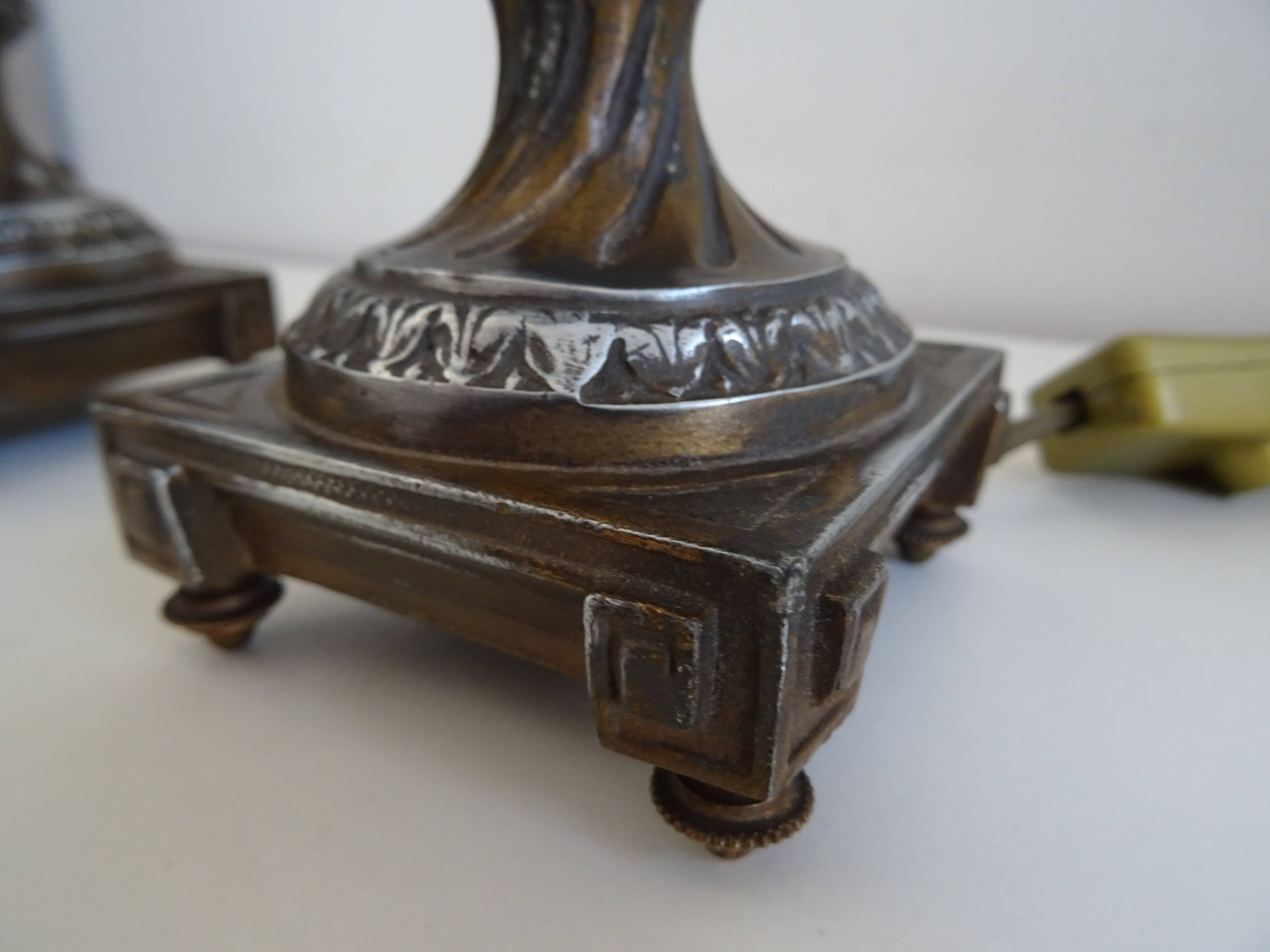 Pair of Louis XVI style lion and cherub decoration lamps