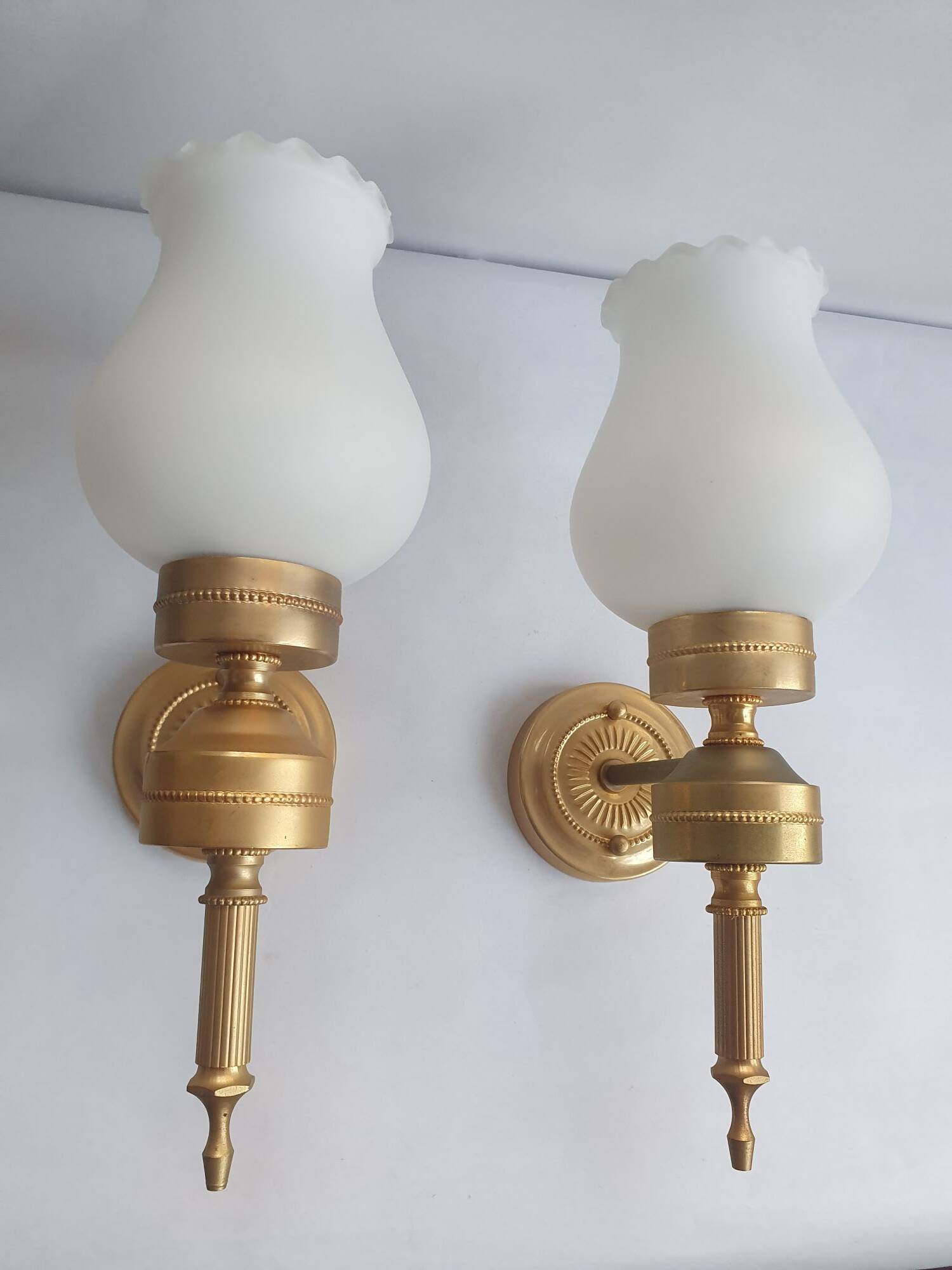 Trois appliques murales dorées flambeau style Empire