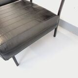 Set of 2 vintage modernist armchairs in black faux leather and metal.