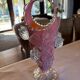 Pink opaline vase with added fruits