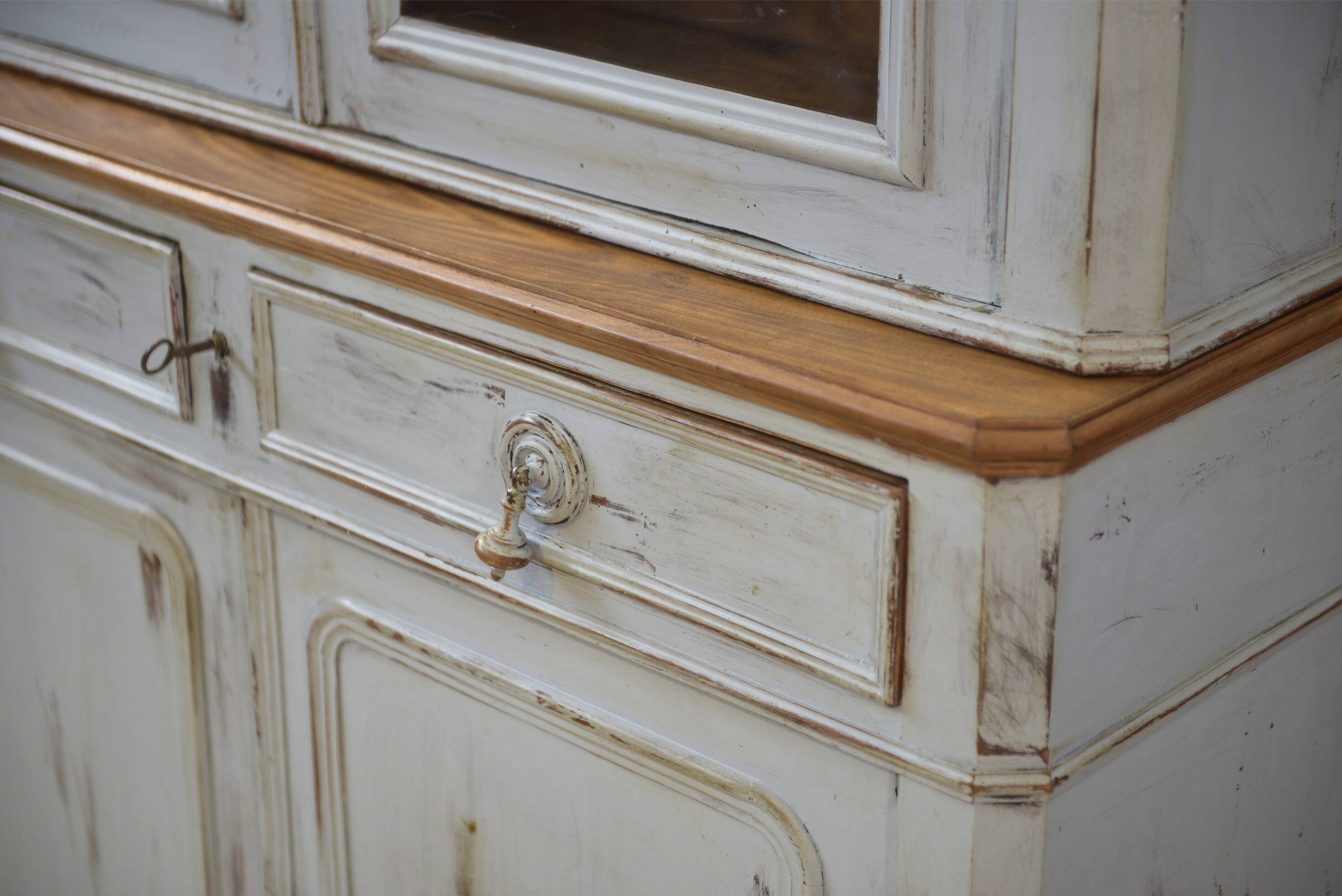 Patinated two-body buffet from the 19th century.