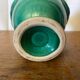 Antique green ceramic vase with handles