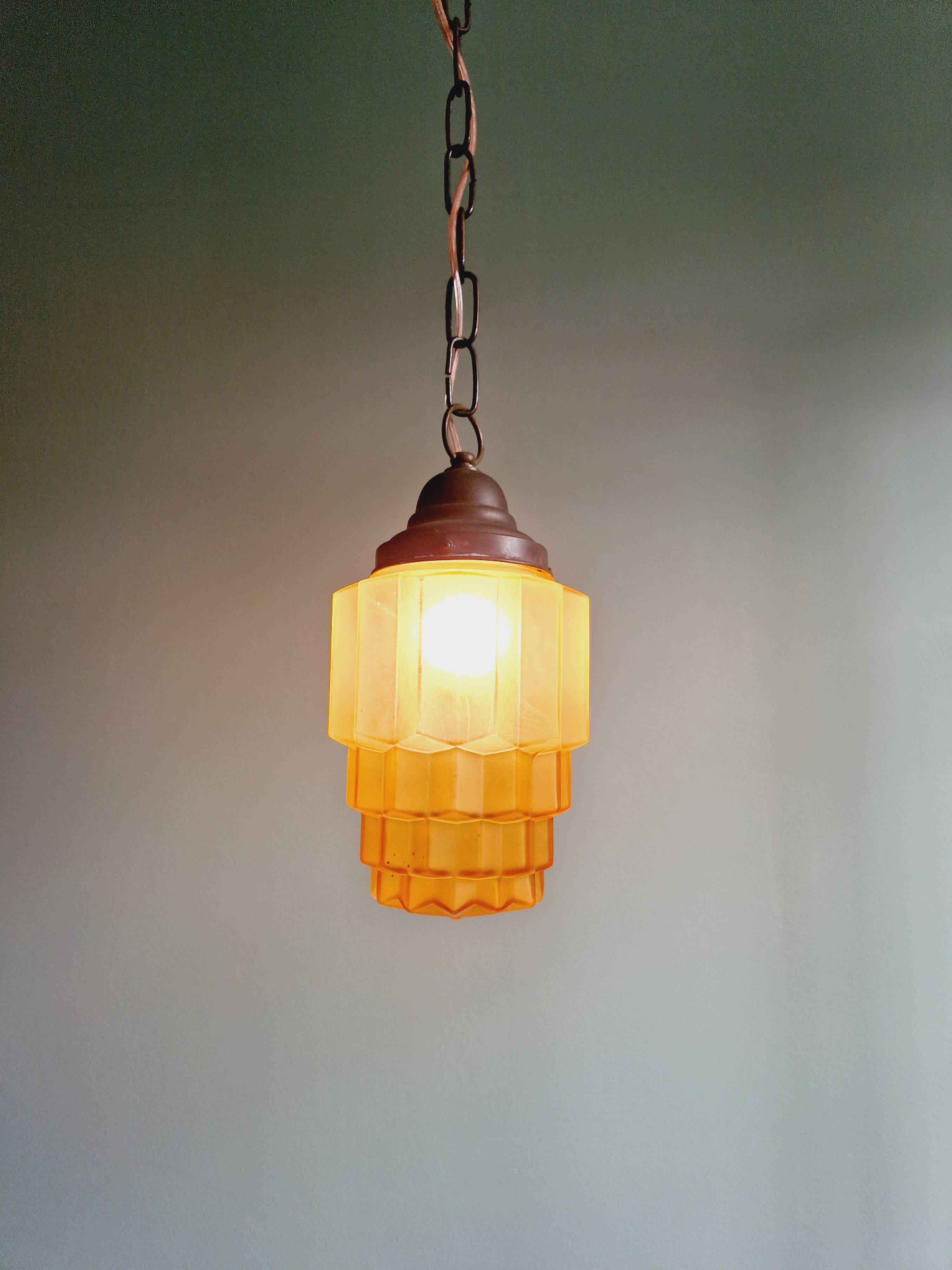 Art Deco Skyscraper type pendant lamp in amber glass, 1920s-30s